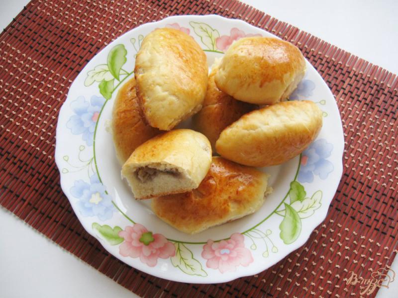 Фото приготовление рецепта: Пирожки с капустой и грибами шаг №11