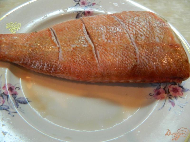 Фото приготовление рецепта: Морской окунь запеченный  под чесночным соусом шаг №1