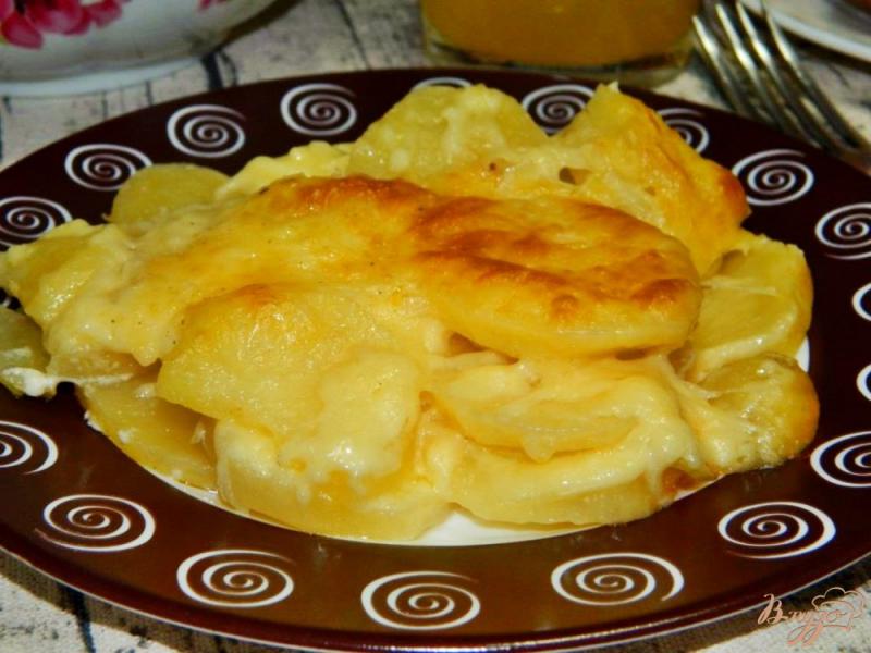 Фото приготовление рецепта: Картошка запеченная с сыром шаг №6
