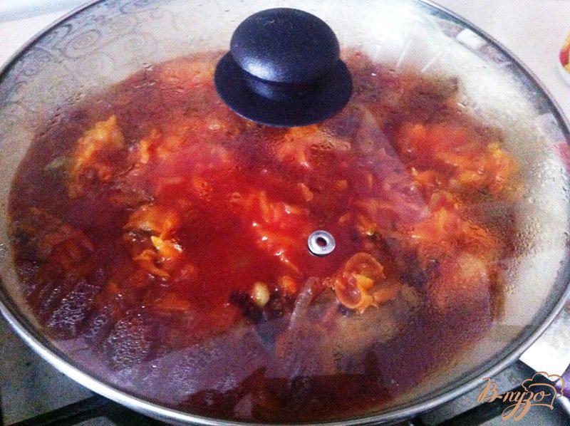 Фото приготовление рецепта: Хек с овощами в томатном соке шаг №10