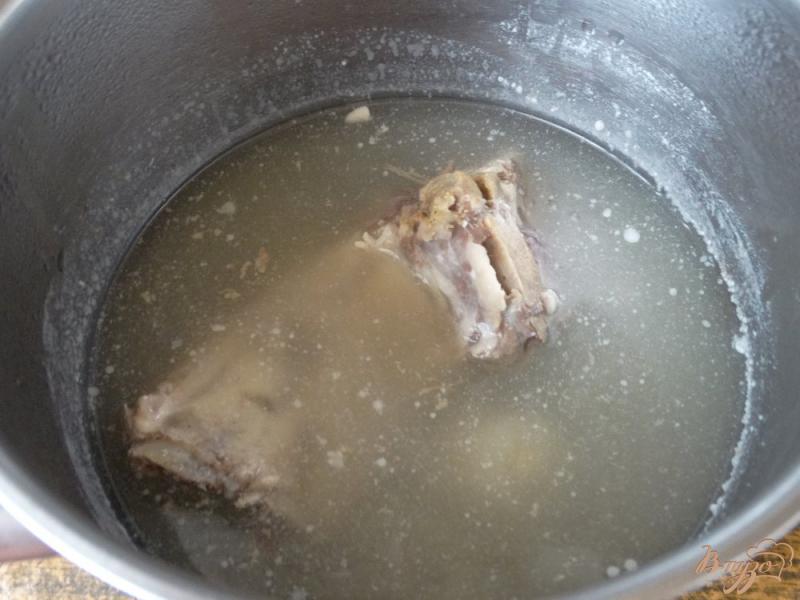 Фото приготовление рецепта: Суп на свиных ребрышках шаг №1