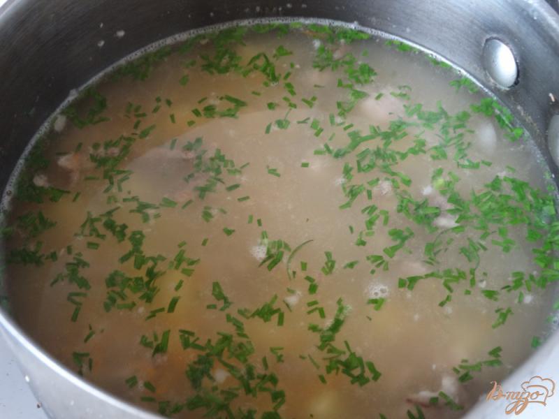 Фото приготовление рецепта: Суп на свиных ребрышках шаг №6