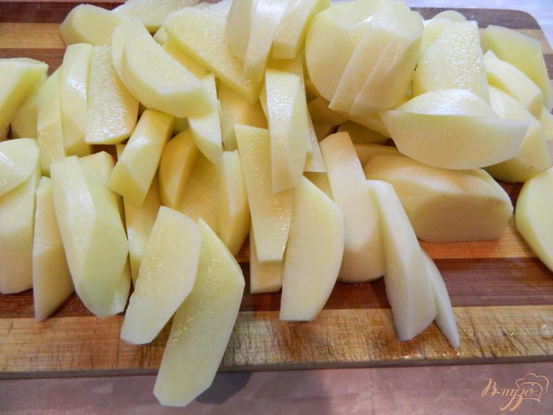 Фото приготовление рецепта: Тыква запеченная с картофелем и чесноком шаг №2