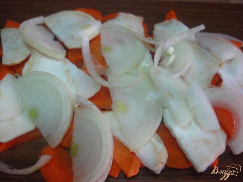 Фото приготовление рецепта: Хек запеченный с овощами шаг №7