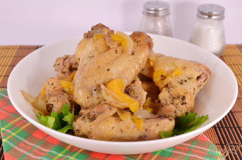 Фото приготовление рецепта: Куриные крылышки с мандаринами запеченные в рукаве шаг №5