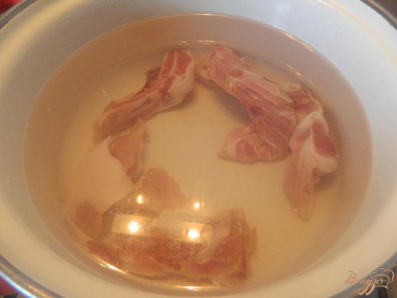 Фото приготовление рецепта: Суп из свиных ребрышек шаг №2