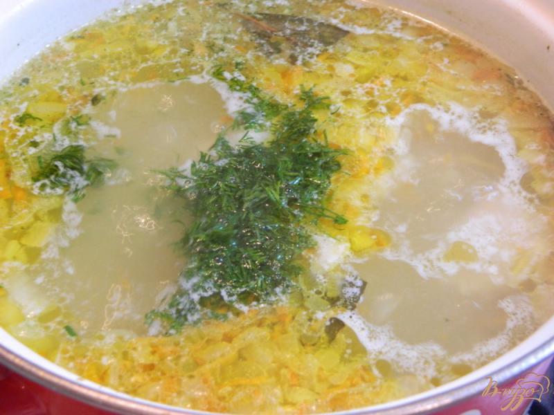 Фото приготовление рецепта: Суп из свиных ребрышек шаг №7