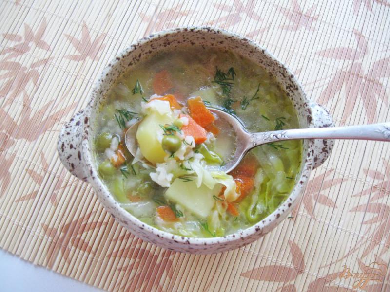 Фото приготовление рецепта: Овощной суп с молодой капустой шаг №7