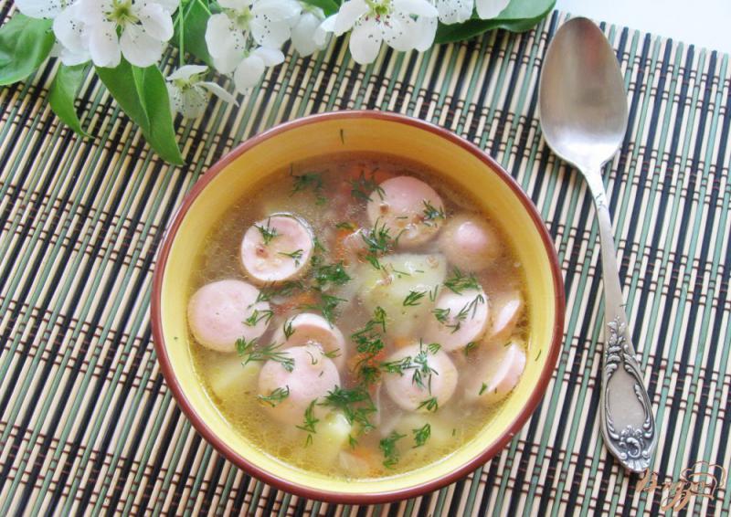 Фото приготовление рецепта: Гречневый суп с сосисками шаг №7