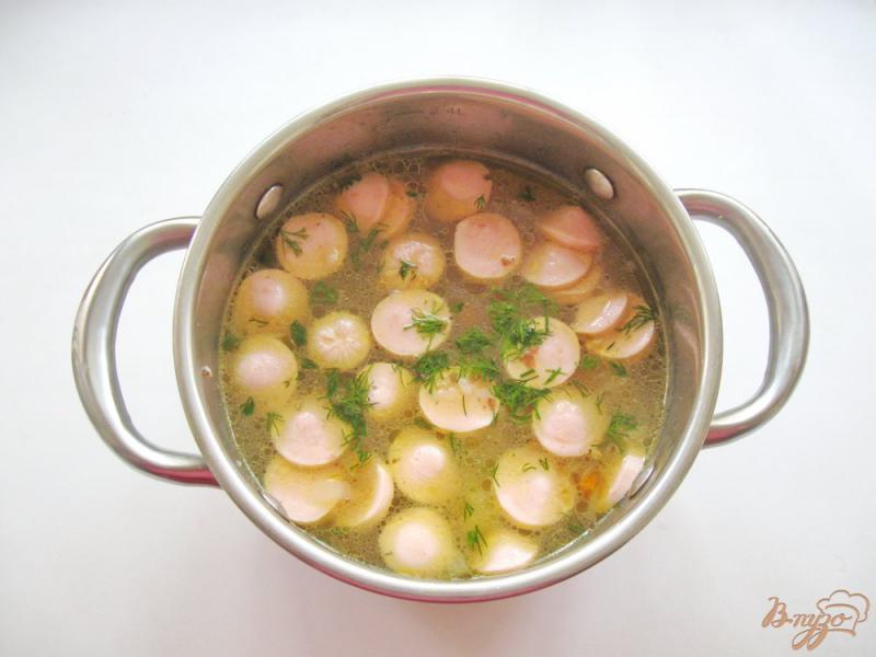 Фото приготовление рецепта: Гречневый суп с сосисками шаг №6