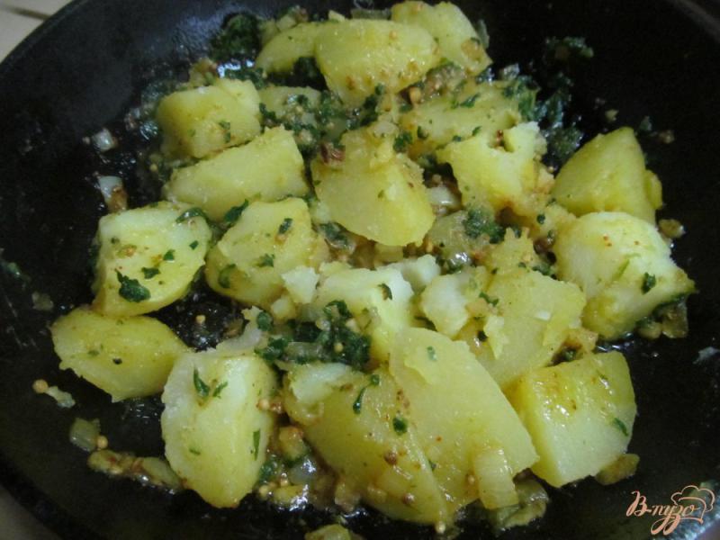 Фото приготовление рецепта: Картофель со специями шаг №5