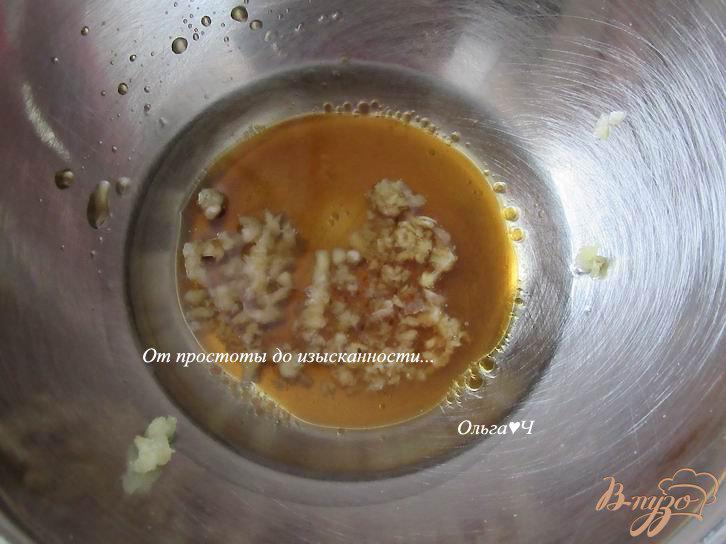 Фото приготовление рецепта: Тыквенные полукольца, запеченные в рыбном соусе шаг №2