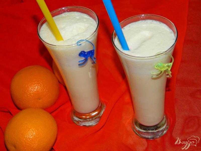 Фото приготовление рецепта: Апельсиновый коктейль с газировкой шаг №4