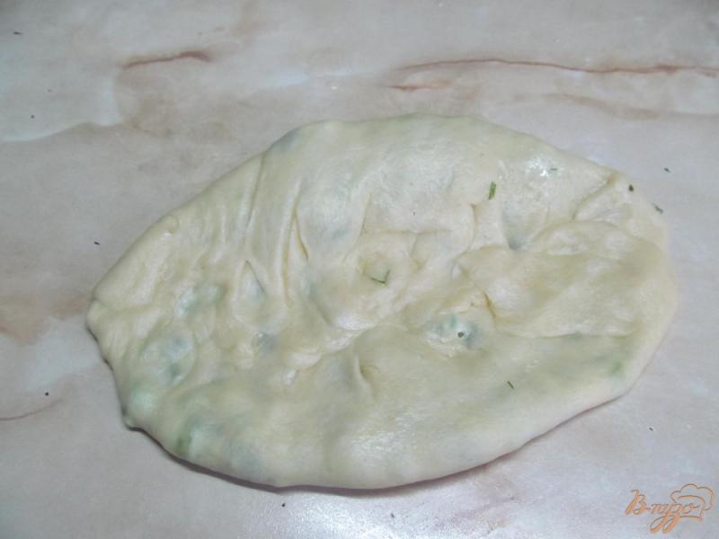 Фото приготовление рецепта: Лепешки с начинкой из зелени и творога шаг №8