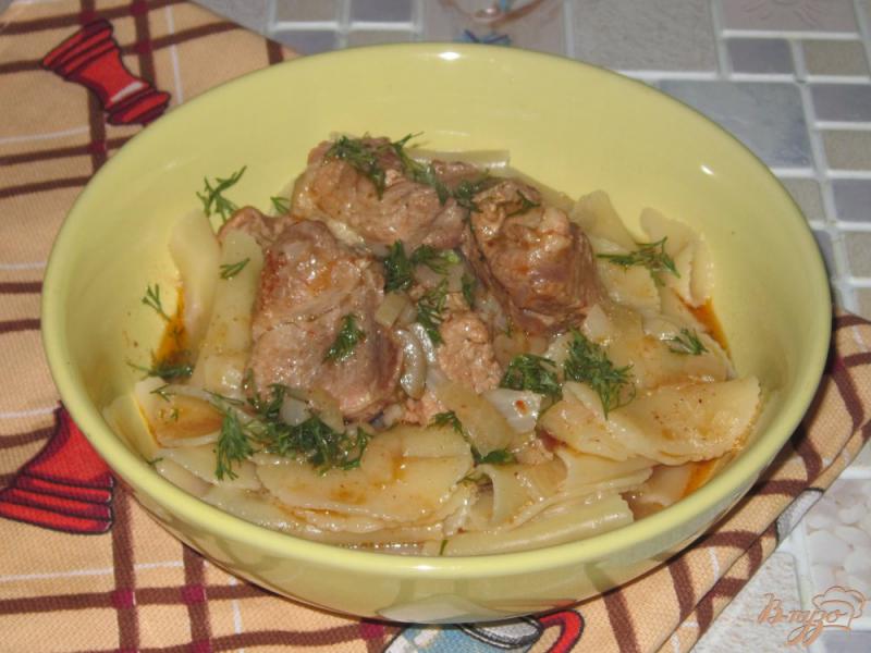 Фото приготовление рецепта: Свинина тушеная с имбирем и паприкой шаг №7