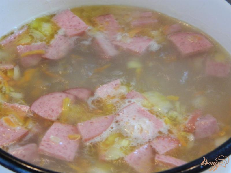 Фото приготовление рецепта: Суп с копченой колбасой шаг №6