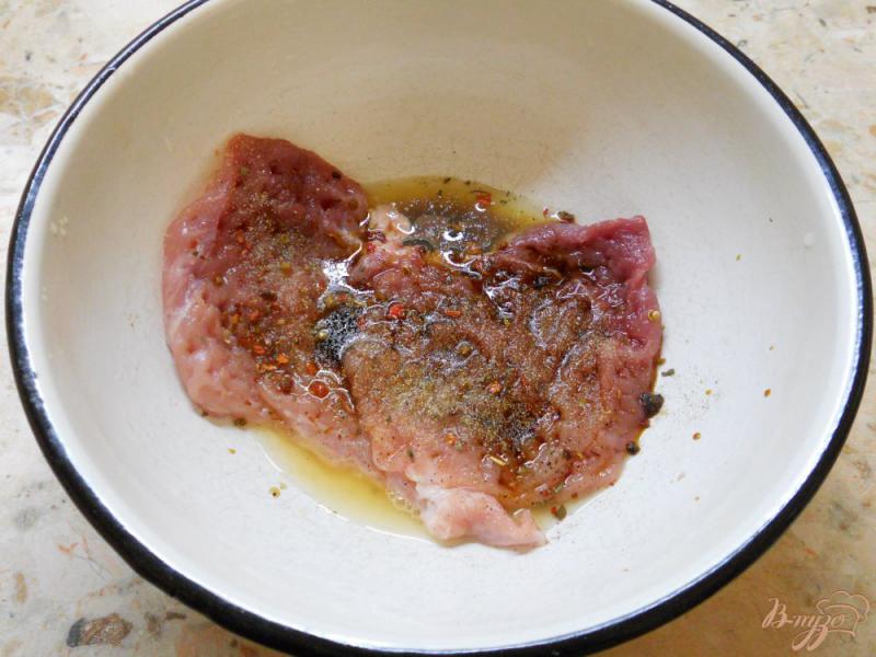 Фото приготовление рецепта: Отбивные из свинины в апельсиновом маринаде шаг №2