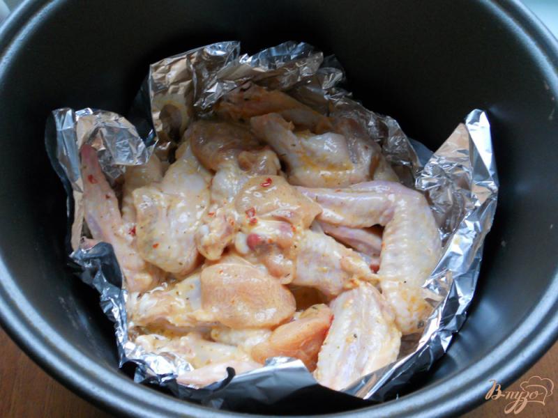 Фото приготовление рецепта: Куриные крылышки «Ароматные» в мультиварке шаг №6