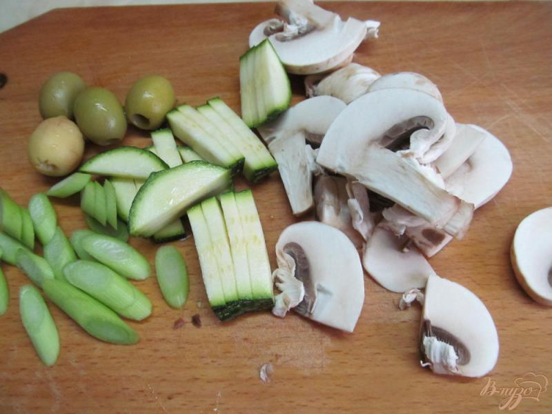 Фото приготовление рецепта: Куриная отбивная с кус-кусом и овощами шаг №6