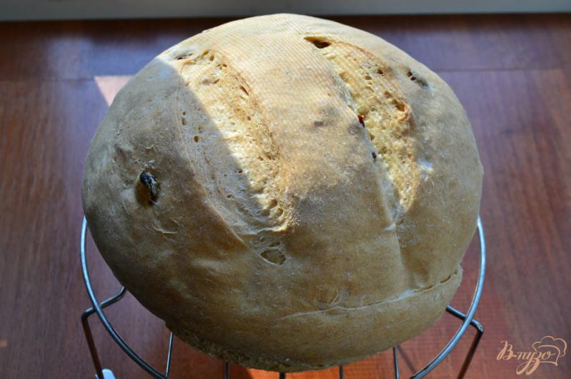 Фото приготовление рецепта: Пшенично-ржаной хлеб с изюмом шаг №6