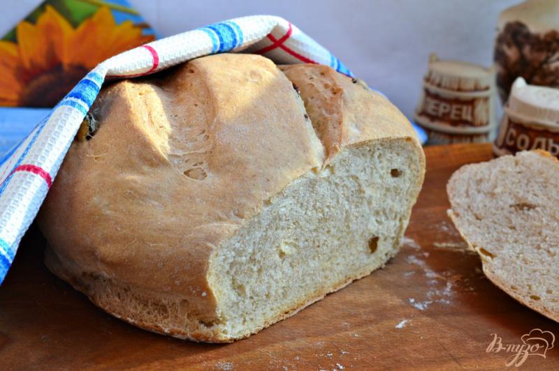 Фото приготовление рецепта: Пшенично-ржаной хлеб с изюмом шаг №7