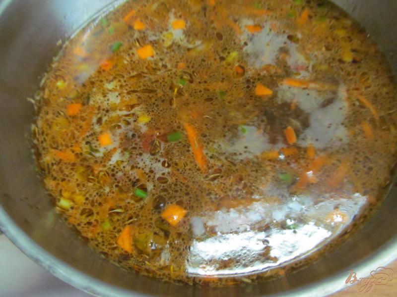 Фото приготовление рецепта: Густой суп из капусты с фаршем и пшеном шаг №5