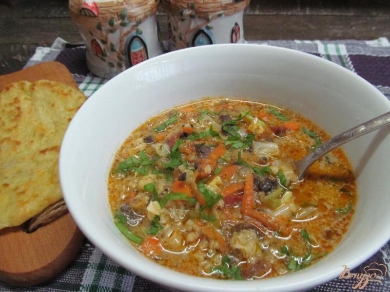 Фото приготовление рецепта: Густой суп из капусты с фаршем и пшеном шаг №9