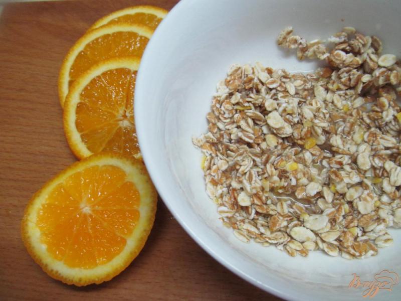 Фото приготовление рецепта: Завтрак из апельсина со злаковыми хлопьями шаг №1
