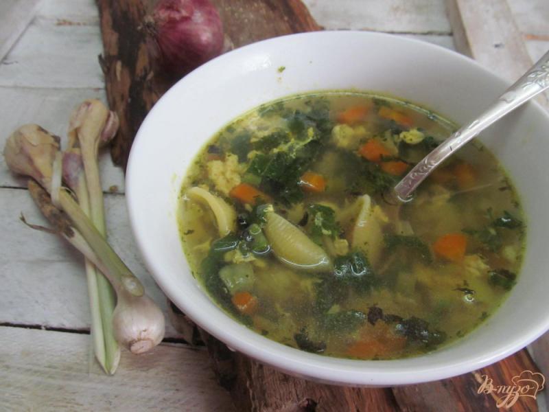 Фото приготовление рецепта: Овощной суп с крапивой на курином бульоне шаг №10