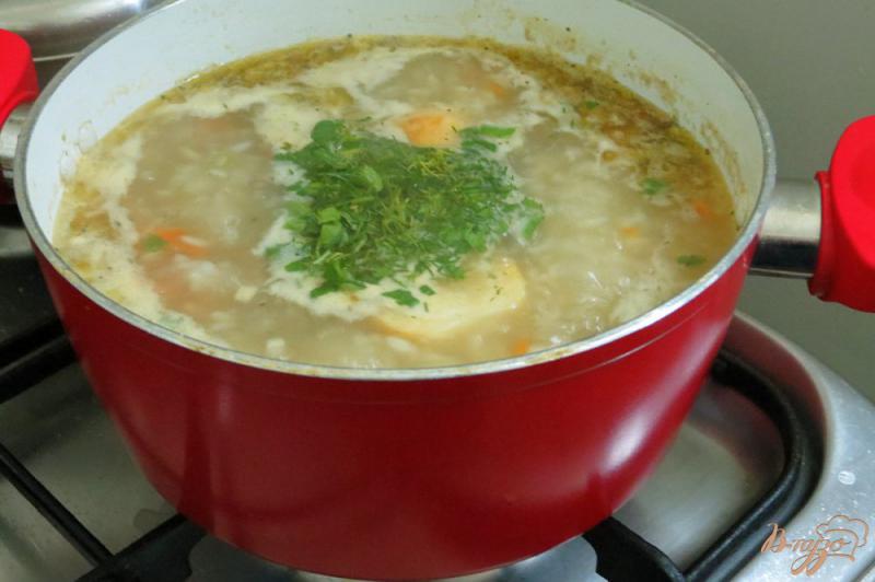 Фото приготовление рецепта: Суп с рисом и овощами шаг №8