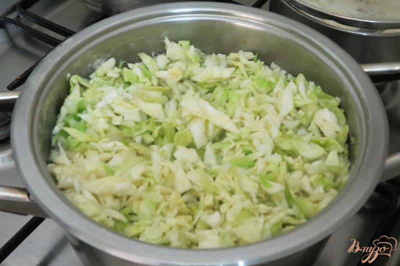 Фото приготовление рецепта: Овощное рагу с сосисками шаг №9