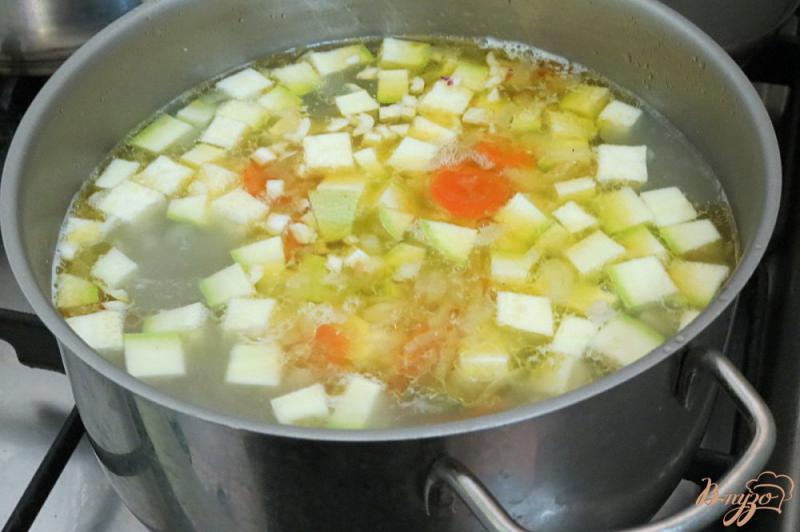 Фото приготовление рецепта: Суп из куриных желудочков с овощами шаг №9