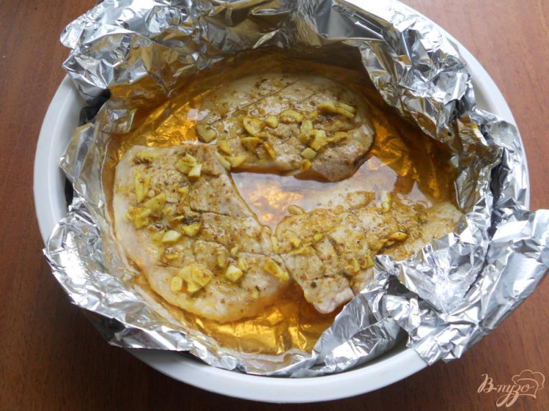 Фото приготовление рецепта: Свинина в чесночно-соевом соусе на пару шаг №5