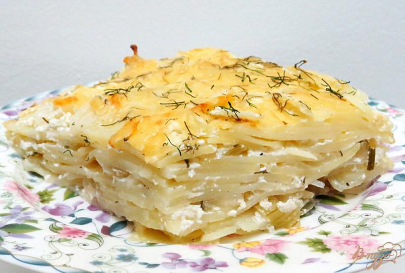 Фото приготовление рецепта: Картофель со сметаной в духовке шаг №11