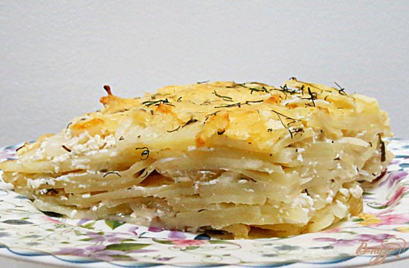 Фото приготовление рецепта: Картофель со сметаной в духовке шаг №10