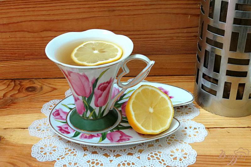 Фото приготовление рецепта: Чай с имбирём, яблоком, лимоном шаг №7