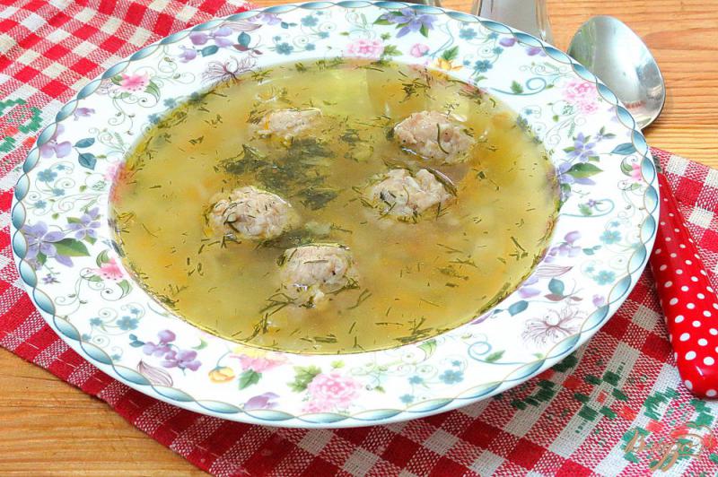 Фото приготовление рецепта: Суп с фрикадельками и вермишелью шаг №12