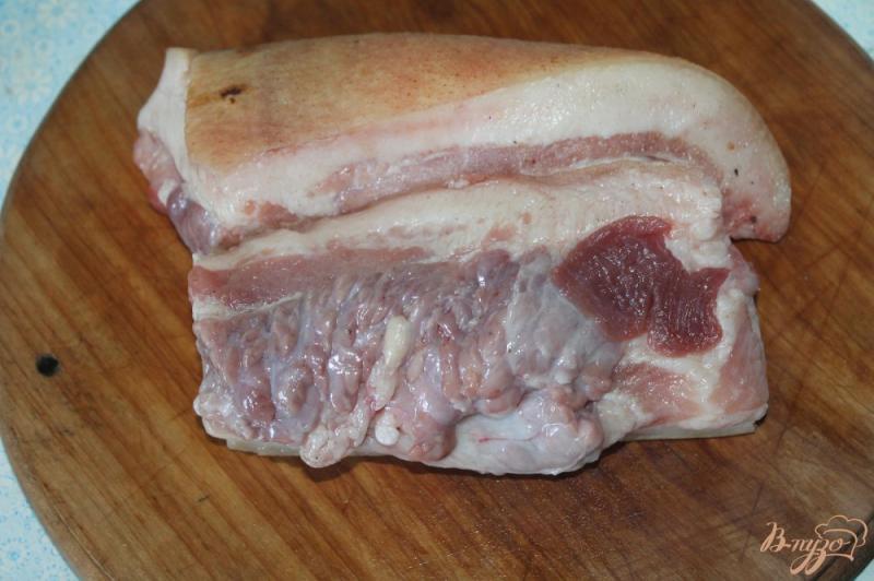 Фото приготовление рецепта: Свиные щечки с чесноком и специями шаг №1