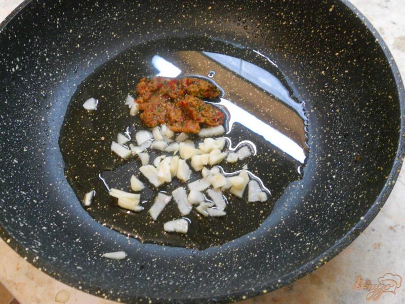 Фото приготовление рецепта: Баклажаны с острым перцем и аджикой по-грузински шаг №4