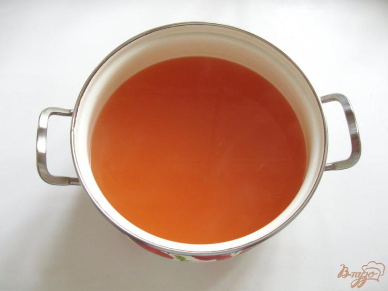 Фото приготовление рецепта: Сливово-яблочный кисель с апельсином шаг №6