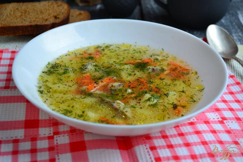 Фото приготовление рецепта: Картофельный суп с рыбой и пшеном шаг №7