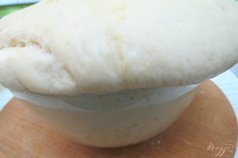 Фото приготовление рецепта: Пирожки печёные с жареной капустой шаг №7