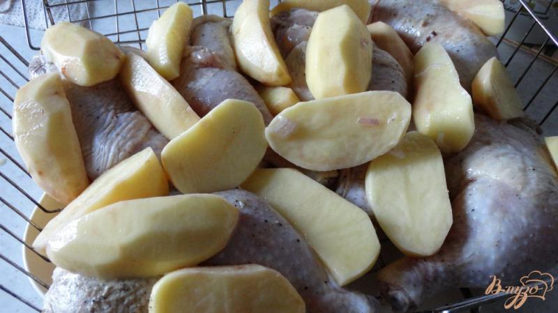 Фото приготовление рецепта: Окорочки в оливковом маринаде на мангале шаг №6