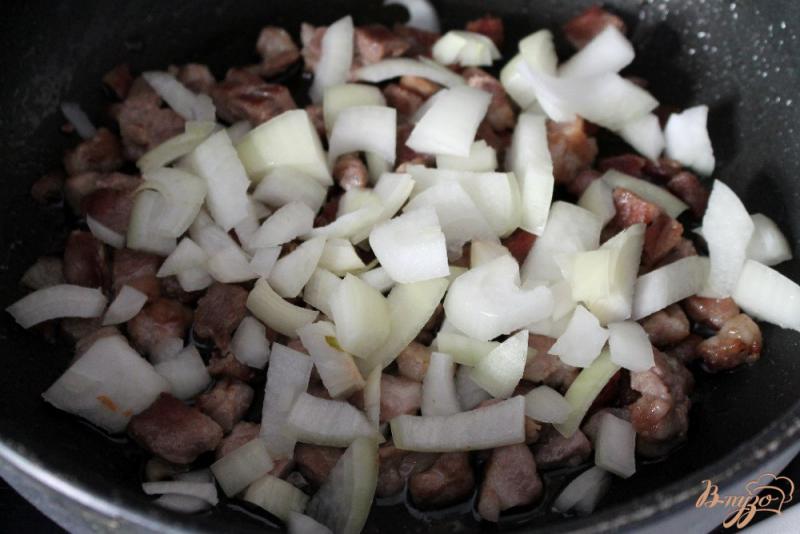 Фото приготовление рецепта: Рис со свининой и перцем ротонда шаг №2