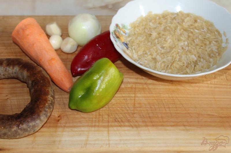 Фото приготовление рецепта: Рис с домашней колбасой и тушенкой в мультиварке шаг №1