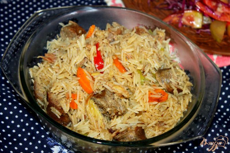 Фото приготовление рецепта: Рис с домашней колбасой и тушенкой в мультиварке шаг №7