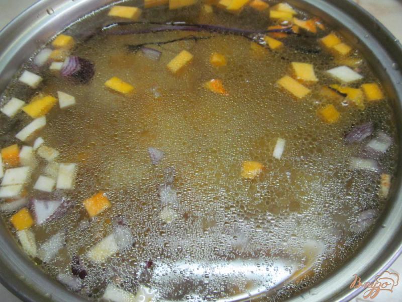 Фото приготовление рецепта: Гречневый суп с тыквой на утином бульоне шаг №4