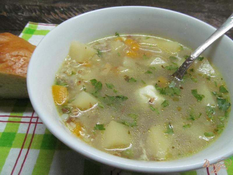 Фото приготовление рецепта: Гречневый суп с тыквой на утином бульоне шаг №7