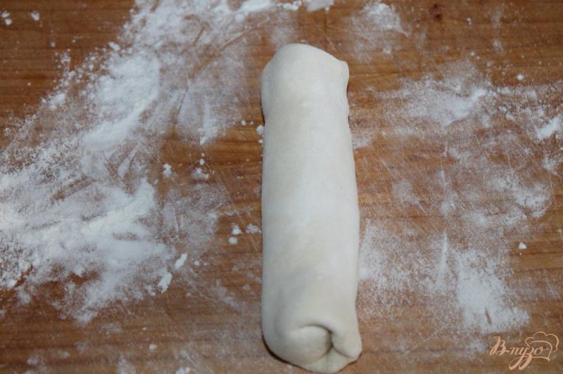 Фото приготовление рецепта: Сосиски в слоеном тесте с льняными семечками шаг №5
