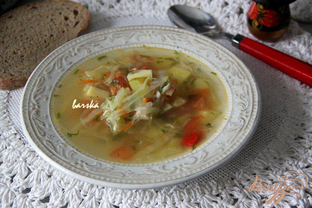 Фото приготовление рецепта: Легкий куриный суп с овощами и кабачками шаг №11